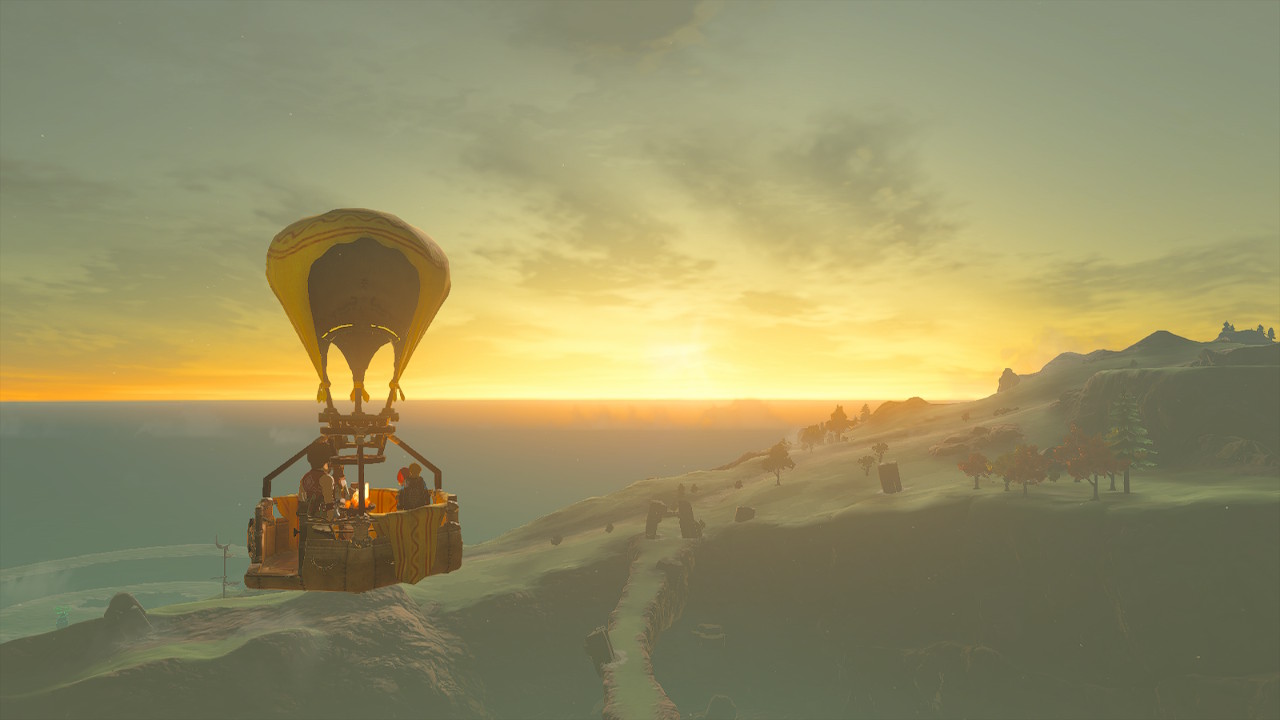 Screenshot of the game, with a hot air balloon flying, with the sunrise in the horizon